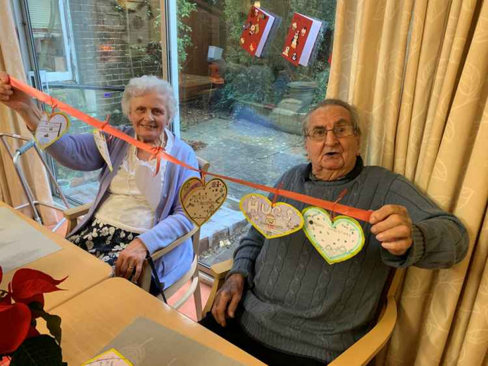 Residents at Montrose Care Home enjoying messages from pupils