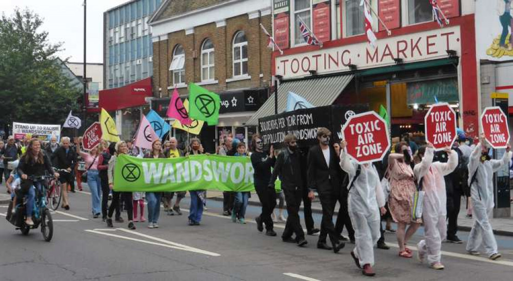 March goes past Tooting Market