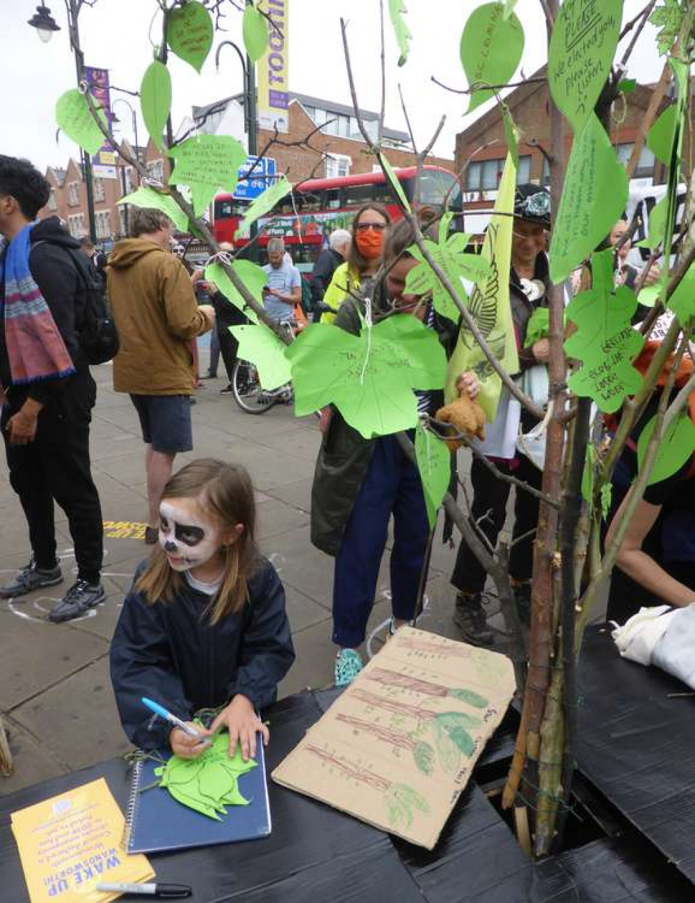 Writing a message to tie to the Tree of Life