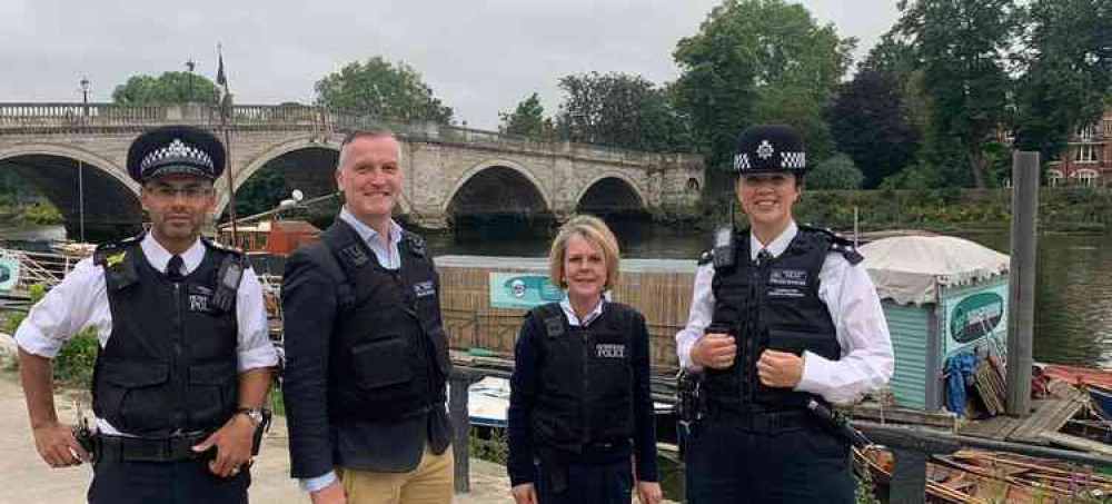 Inspector Robinson, right, with the council leader and police colleagues