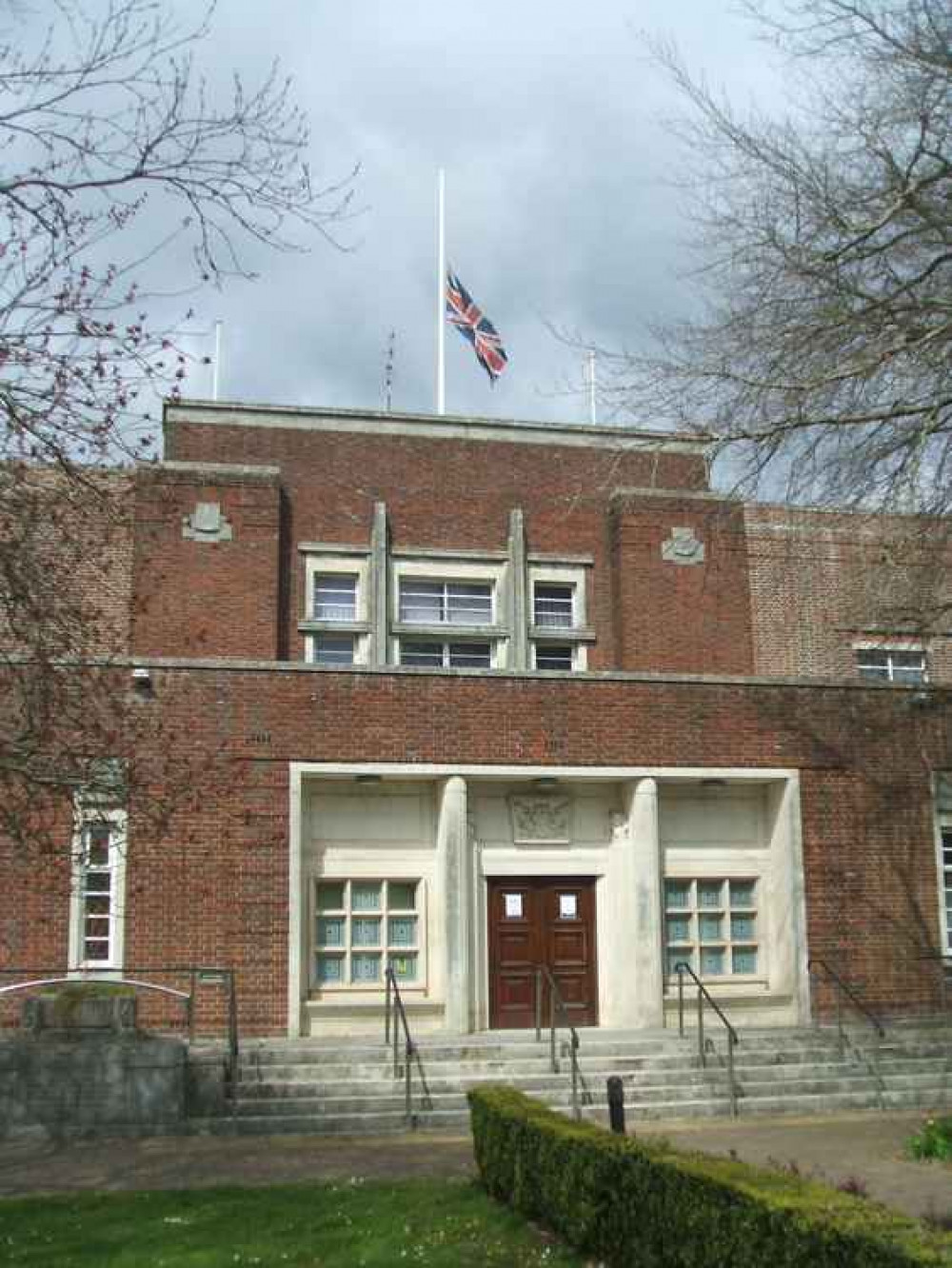 The flag at half-mast at County Hall in Dorchester The flag at half-mast at County Hall in Dorchester