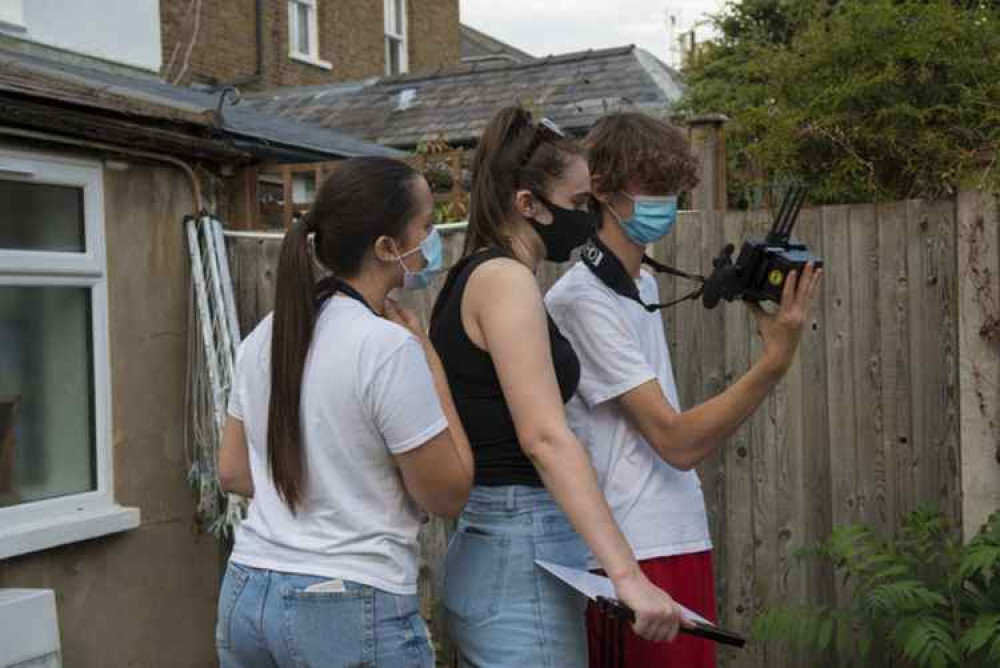 Chloe, Honor and Joe behind the scenes