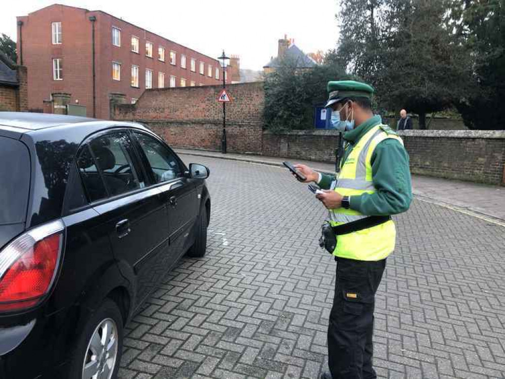 A parking attendant in the age of covid