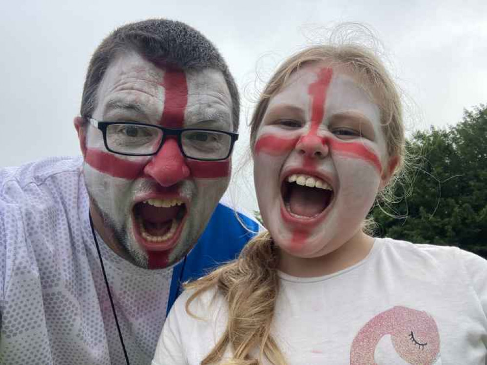 Headteacher Gary Spracklen with Year 4 pupil Layla