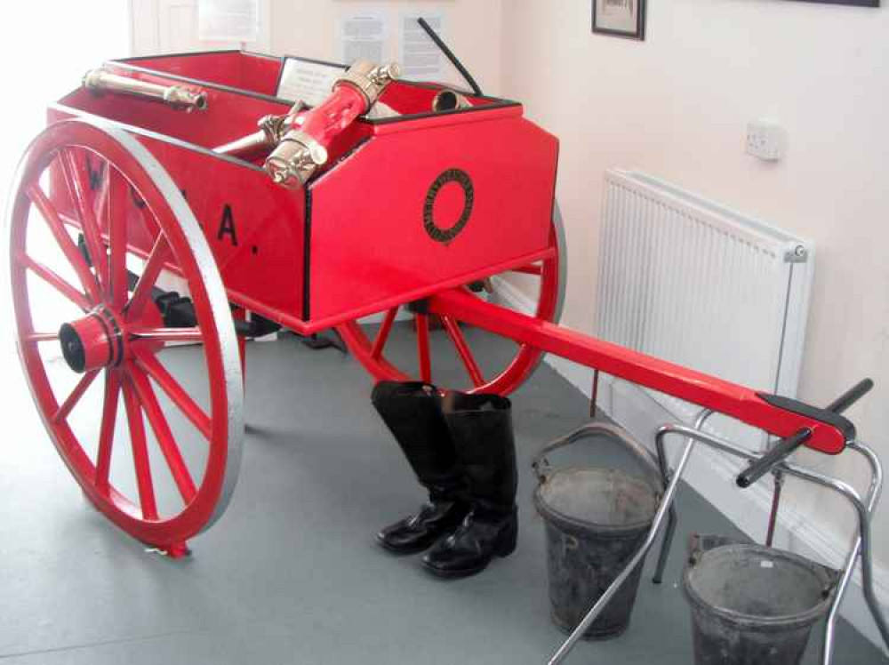 A museum exhibit - an original Merryweather fire cart purchased by Starcross Hospital in around 1900