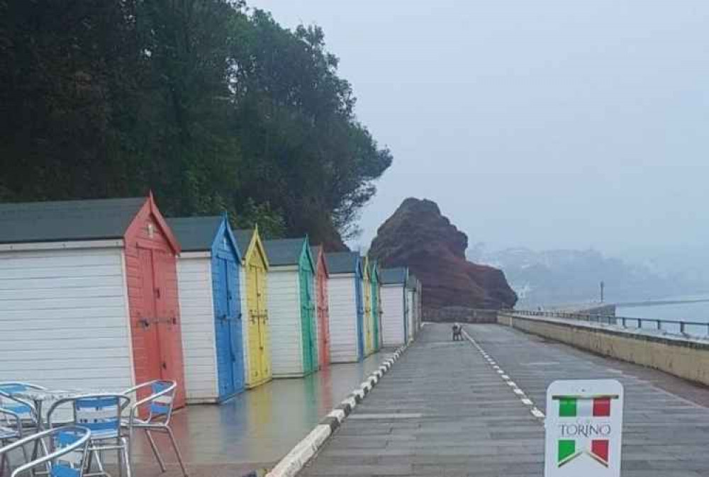 The cafe, near the colourful beach huts. Picture by The Cove Cafe