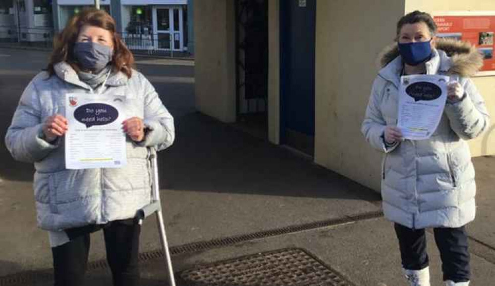 Cllr Carole Tamlyn (Chairman of the group) and Cllr Val Mawhood (Deputy Mayor) outside the public toilets, prior to putting posters up inside.