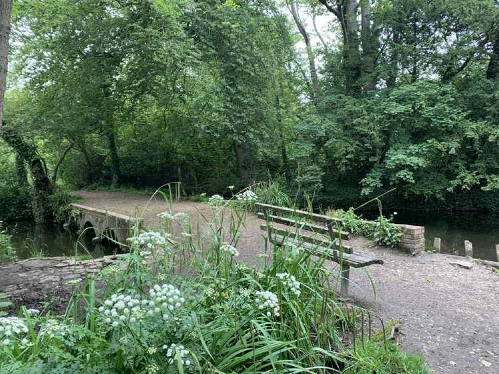 Walk alongside the river and follow the path and you will come out by a bridge on your left