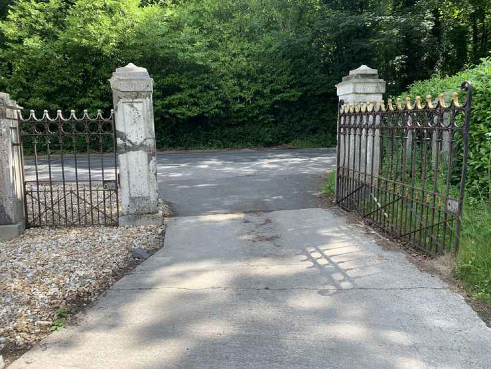 When the path meets a road, cross the road and turn left to walk along the pavement