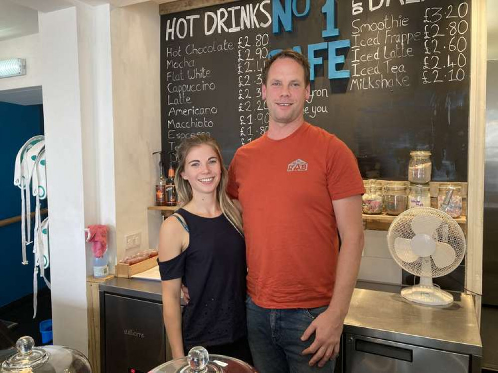 Kimberley and Byron behind the counter