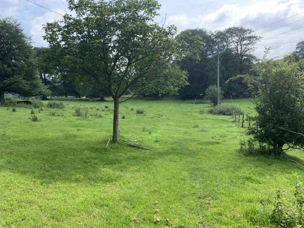 Go straight through the field to a kissing gate at the other side