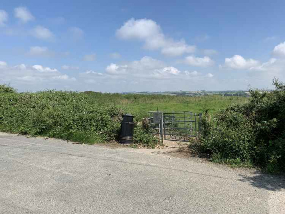 Opposite the entrance to Poundbury cemetery there is gate, go through it and turn left