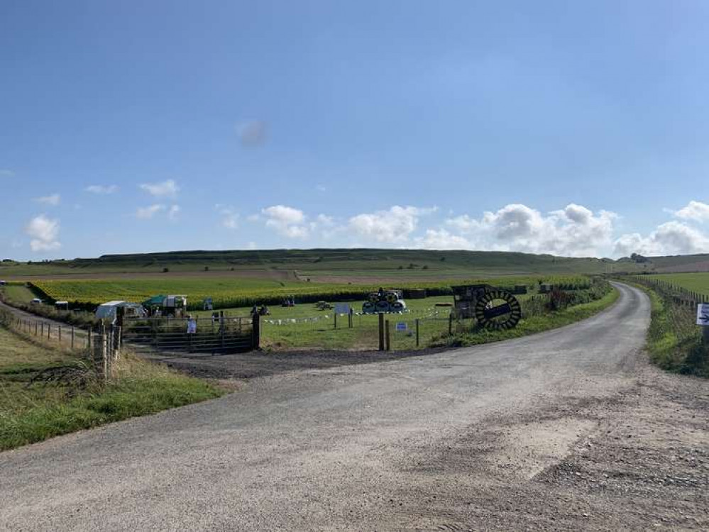 Maiden Castle Farm on your left Maiden Castle Farm on your left