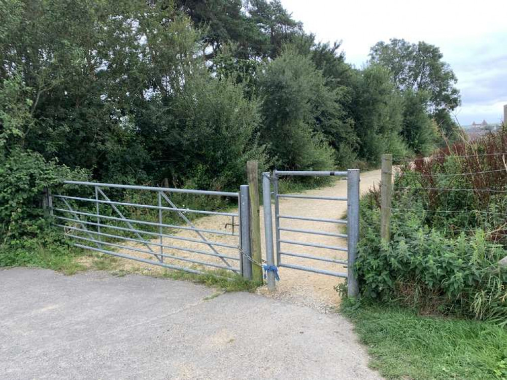 Go through the gate just after Poundbury cemetery