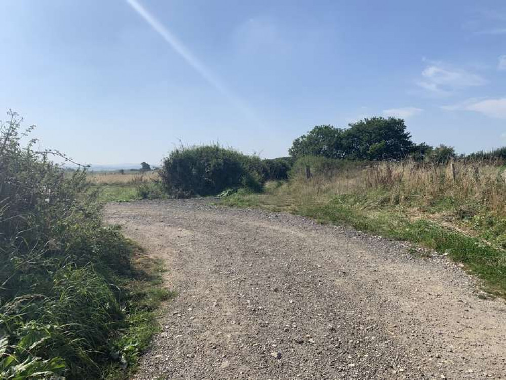 Continue straight when the gravel path turns to the left