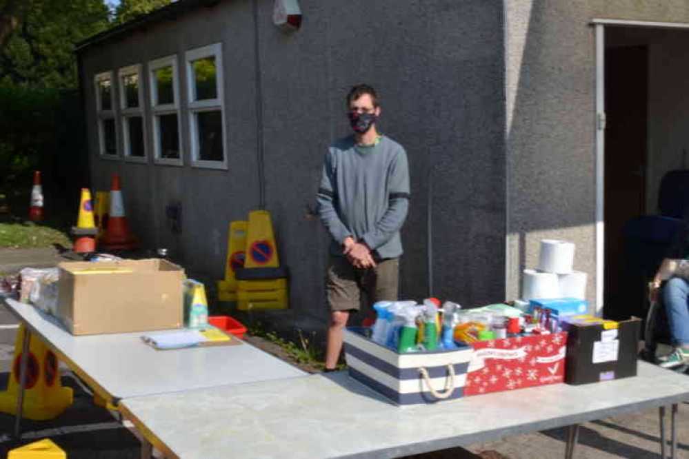 Marek gets ready to help out with the emergency food supplies