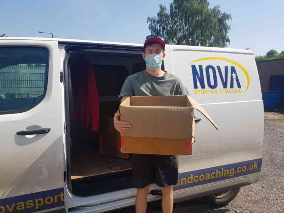 Alex from Nova delivers one of the aid parcels