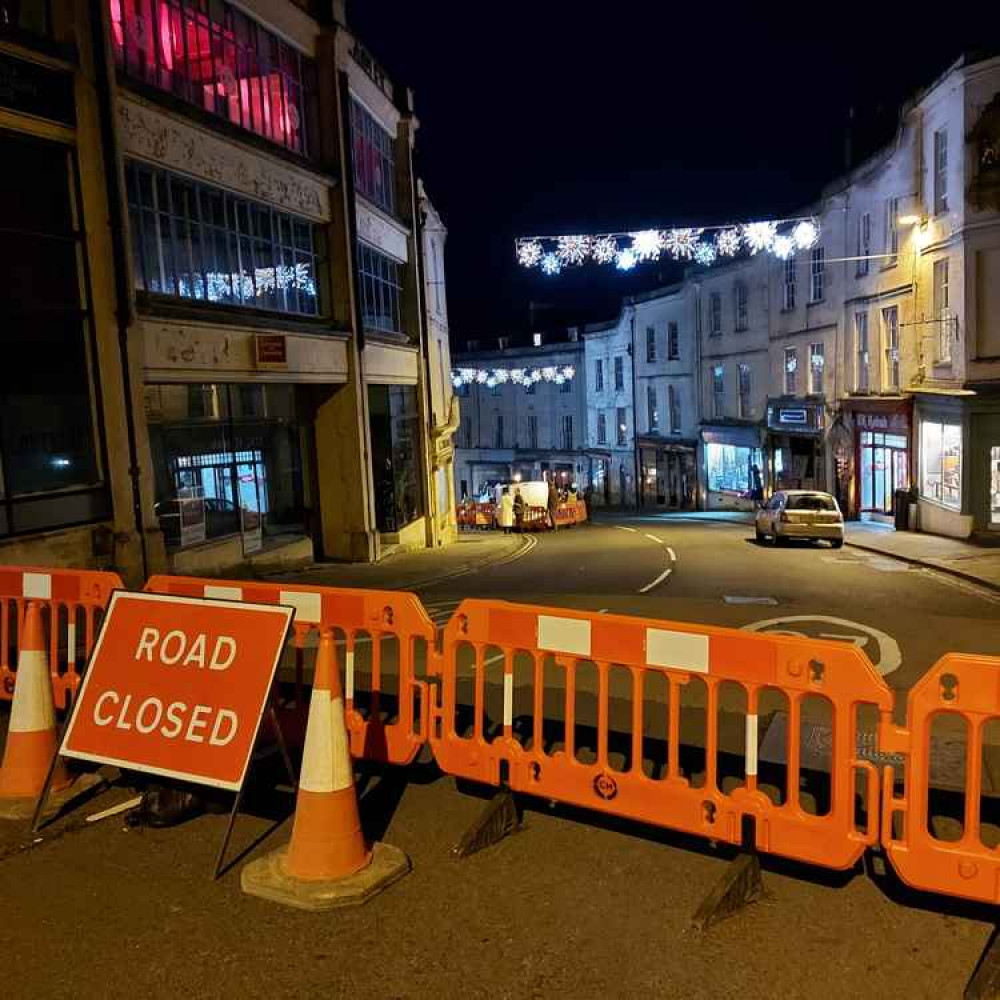 The road is closed off to through traffic