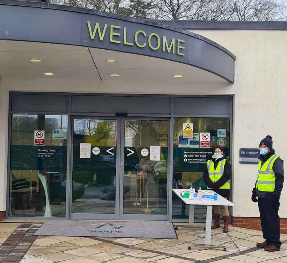 A warm welcome awaits at Mendip Council Offices: Volunteer staff assist residents who roll-up for their lifesaving vaccines