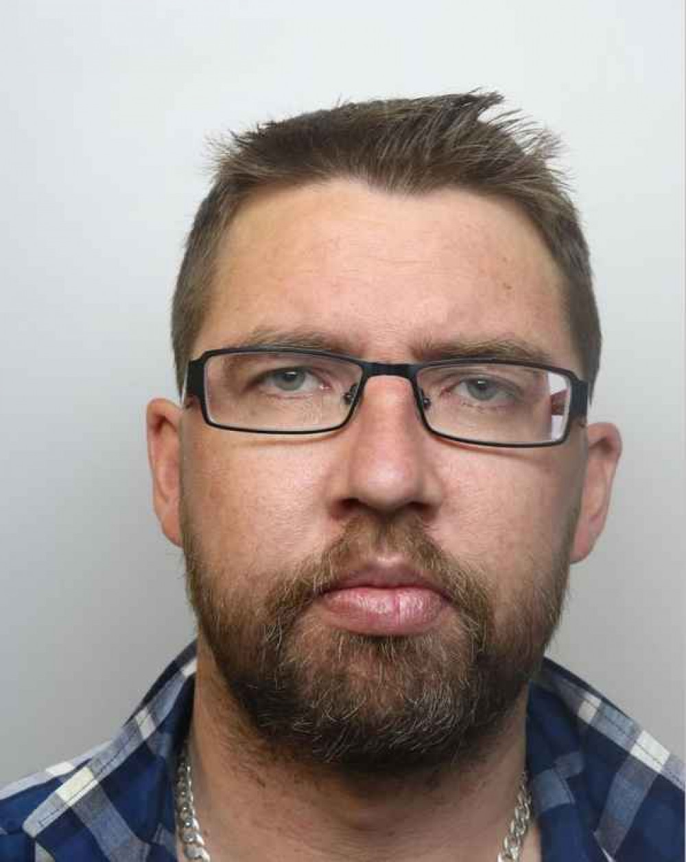 Police issued this photo of him to help trace his whereabouts Police issued this photo of him to help trace his whereabouts