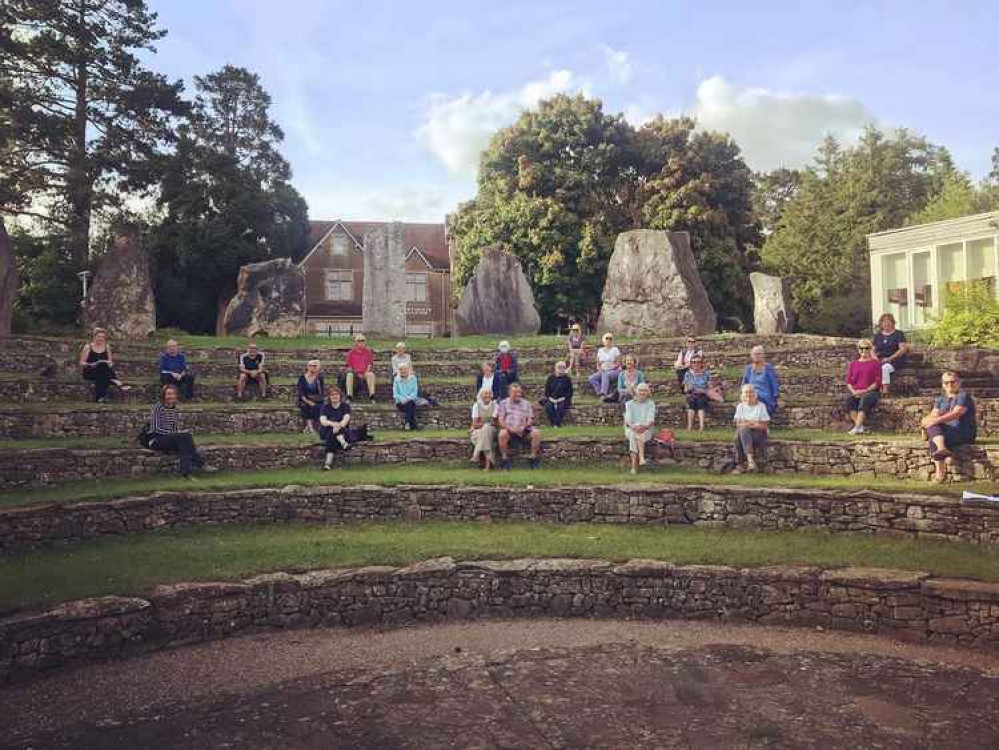 Volunteers - vital to keeping the theatre running - sit in the ECOS amphitheatre