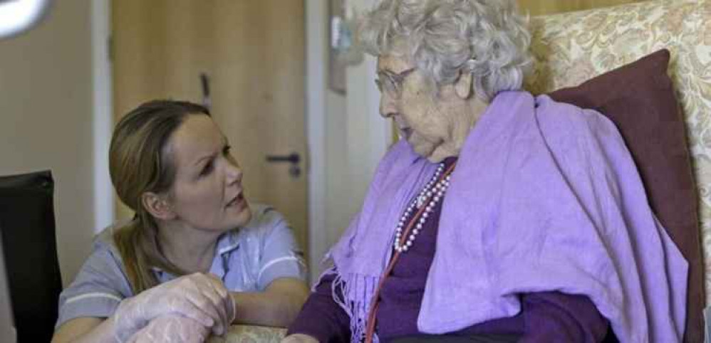 An Elderly Somerset Resident Receiving Care From A Nurse. CREDIT: Healthwatch Somerset. Free to use for all BBC wire partners.