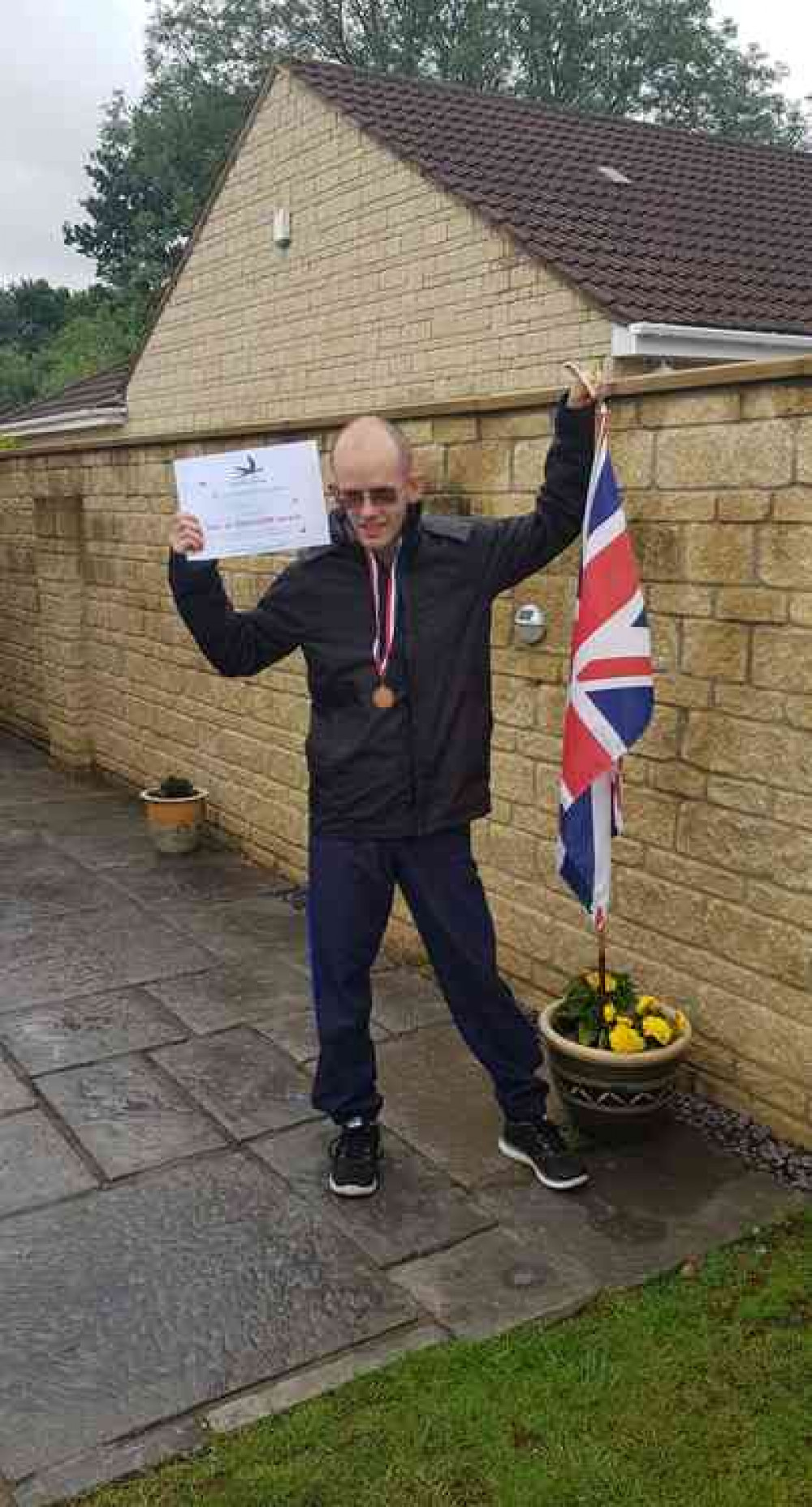 Mark celebrating completing 1000 laps with his Star of SWALLOW Award Mark celebrating completing 1000 laps with his Star of SWALLOW Award