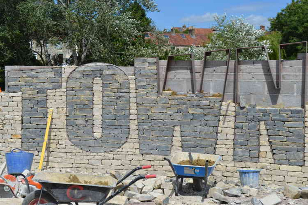 Spelling out the name of the park in blue lias stone looks incredible