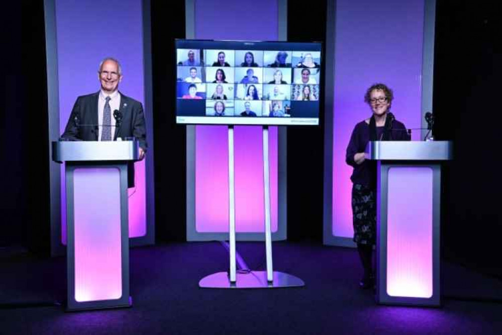 Simon Knighton, Chairman, and Janet Rowse, Chief Executive, with all winners on the screen.