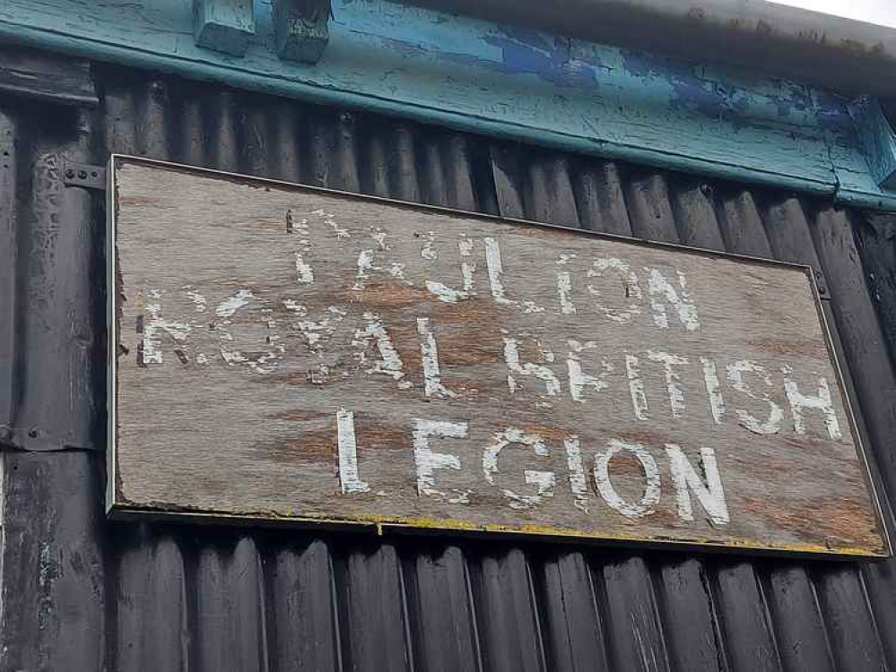 The sign is very weathered The sign is very weathered