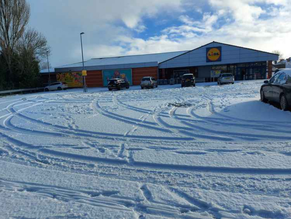 The Frome Lidl staff were also faced with snow clearing duties on January 24 The Frome Lidl staff were also faced with snow clearing duties on January 24