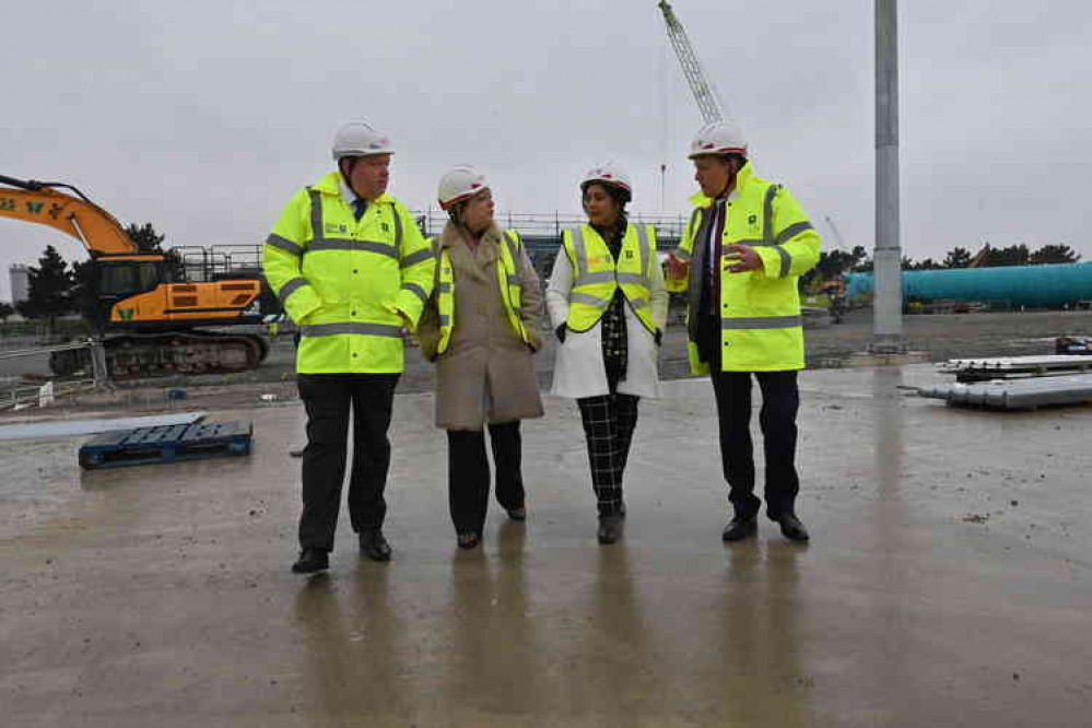 From left: Peter Ward, Commercial Director, Port of Tilbury, Thurrock MP Jackie Doyle-Price; Maritime Minister Nusrat Ghani MP; Charles Hammond, Group Chief Executive, Forth Ports;  on the site of the new London port, Tilbury2.