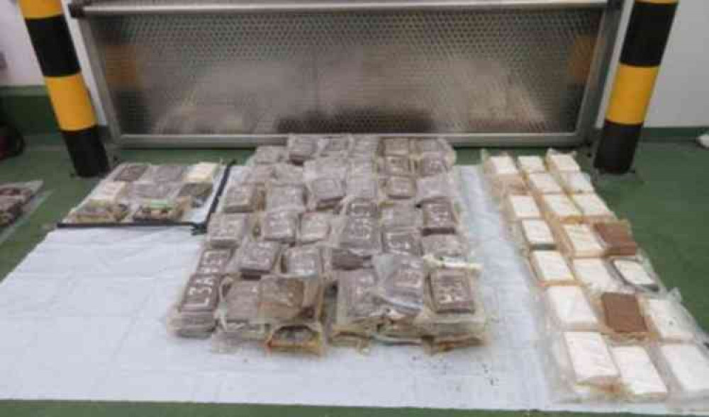 The confiscated drugs haul packed in the floor of a container