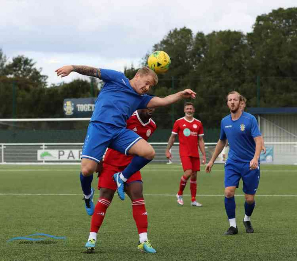 Aerial action from Aveley's Mitch Gilbey. Picture by Kevin Lamb.