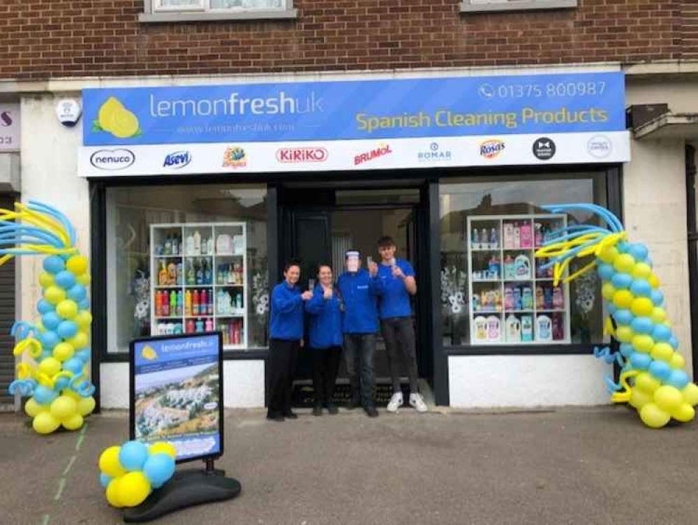 Ian Colley, family and friends toast their new business.