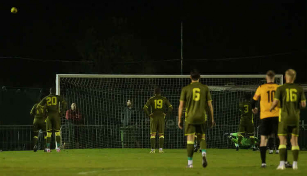 High, wide and not very handsome. Paris Hamilton-Downes' appalling penalty is captured by Micky Cartwright