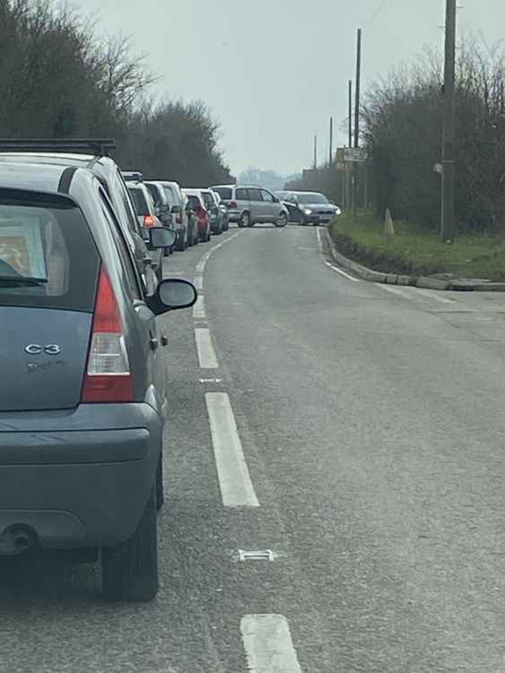 Cars queuing up at the tip this morning.