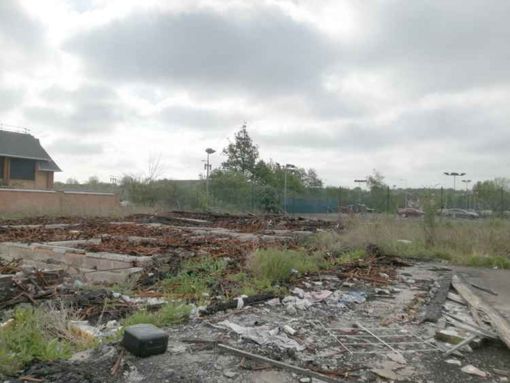 This previously derelict site has been fenced off and turned into a car yard.