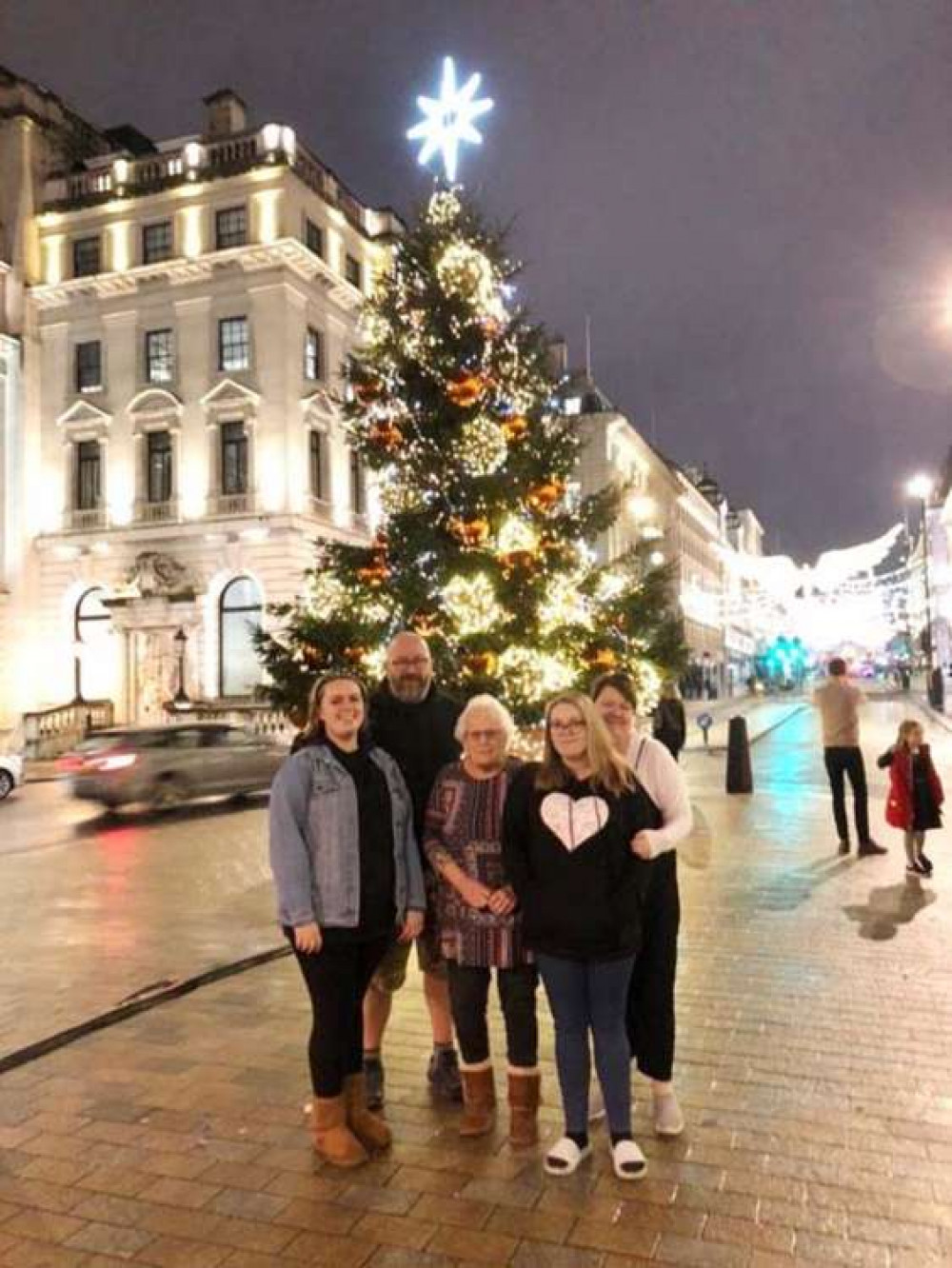 Becca and Kelsey with their mum, dad and nan.