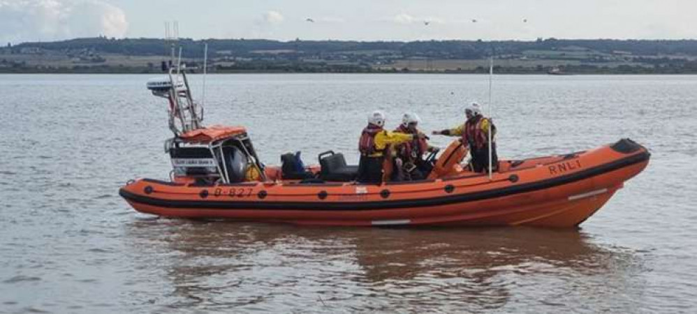 The Gravesend lifeboat stands by.