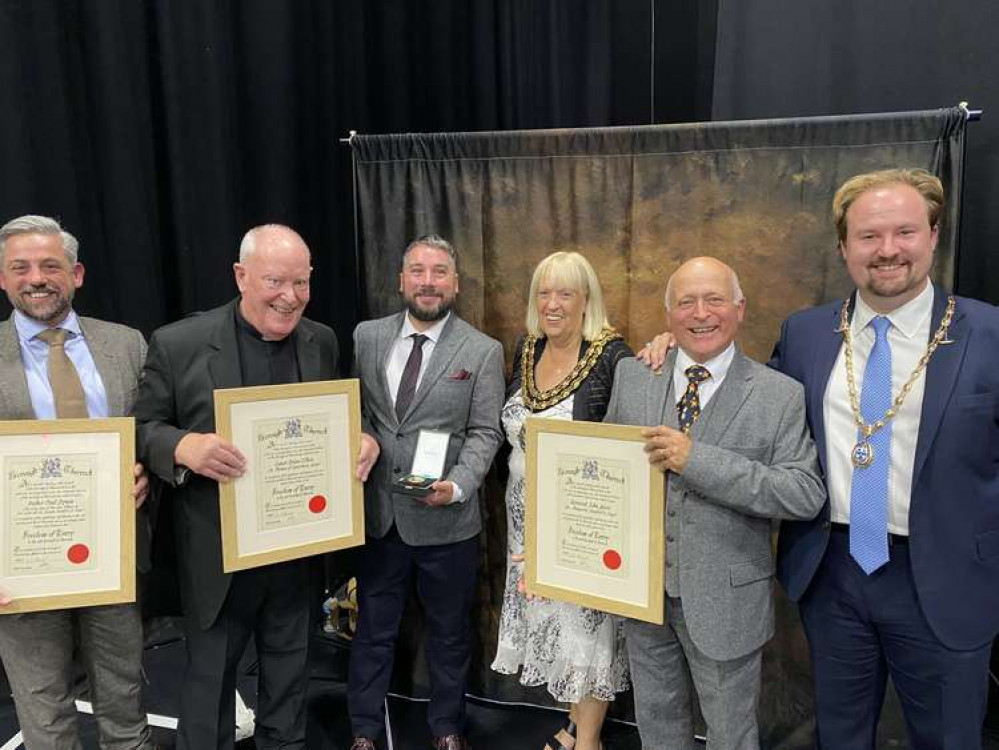 Michael and Jay Dynan with Canon Brian O'Shea, Mayor Cllr Sue Shinnick, Rev John Guest and Cllr James Halden. Michael and Jay Dynan with Canon Brian O'Shea, Mayor Cllr Sue Shinnick, Rev John Guest and Cllr James Halden.