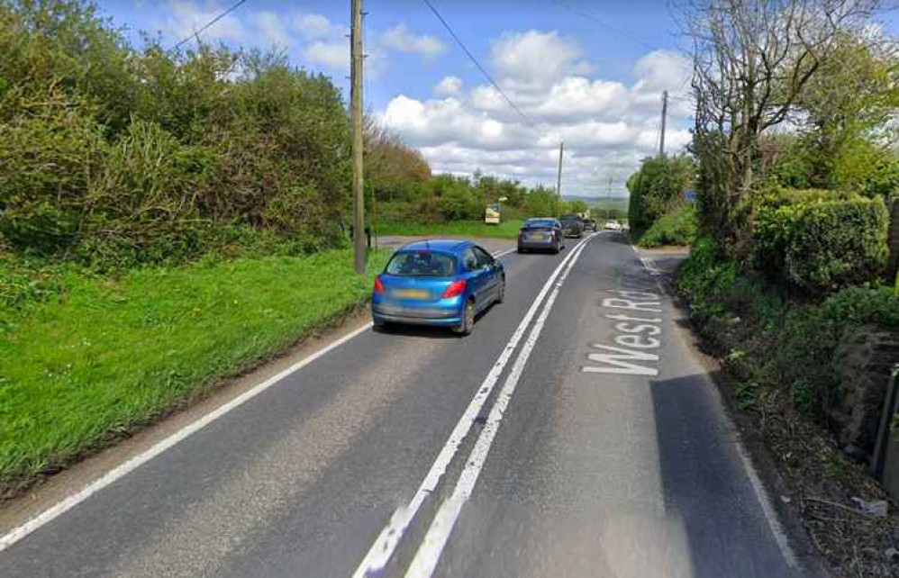 A35 partially blocked near Symondsbury due to a broken-down lorry