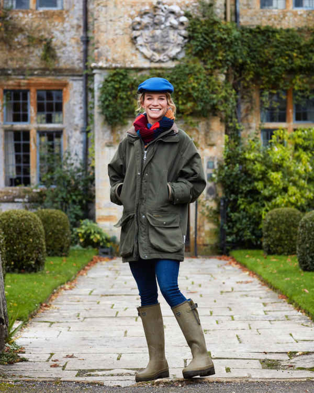 Julie Montagu in front of Mapperton House