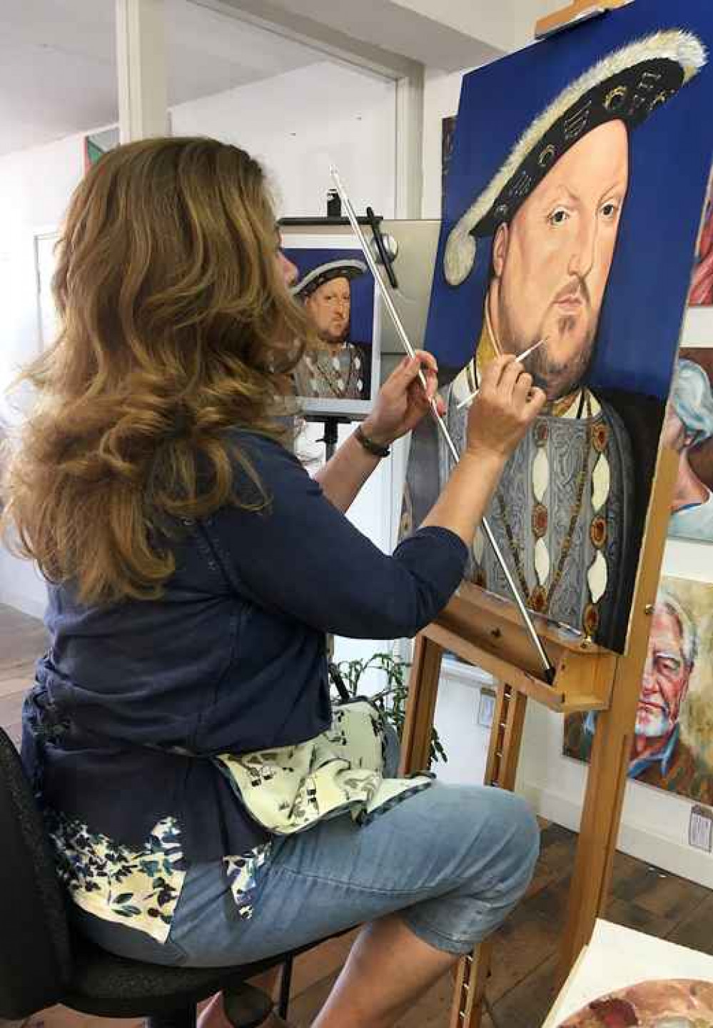 Elizabeth Sporne painting the Henry VIII portrait