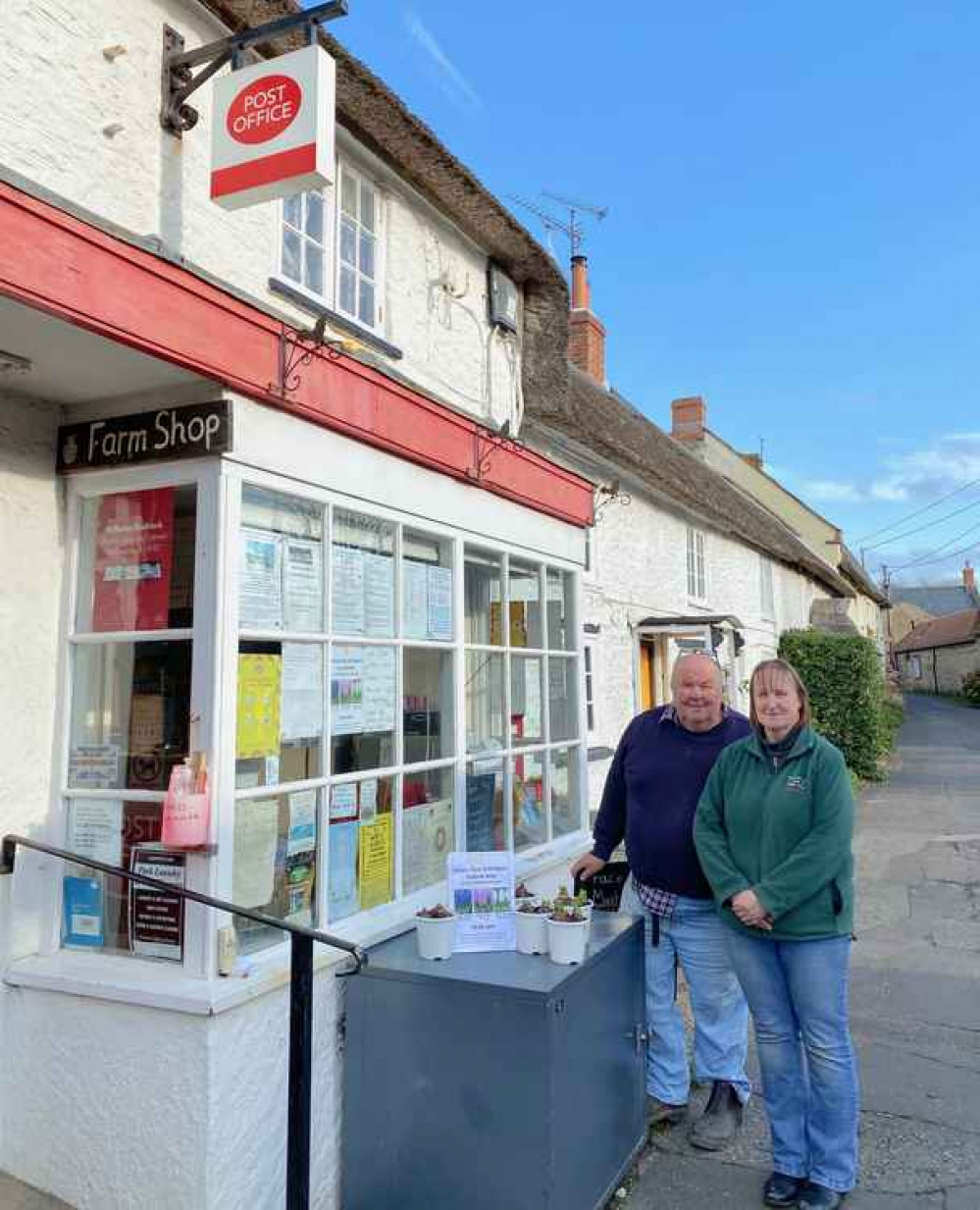 Pete and Gill Mayo at their Burton Bradstock Post Office shop