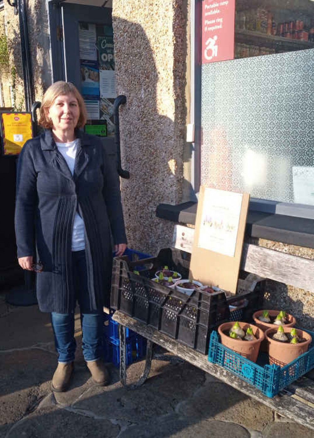 Lisa Finlayson at their Bradpole Post Office shop.