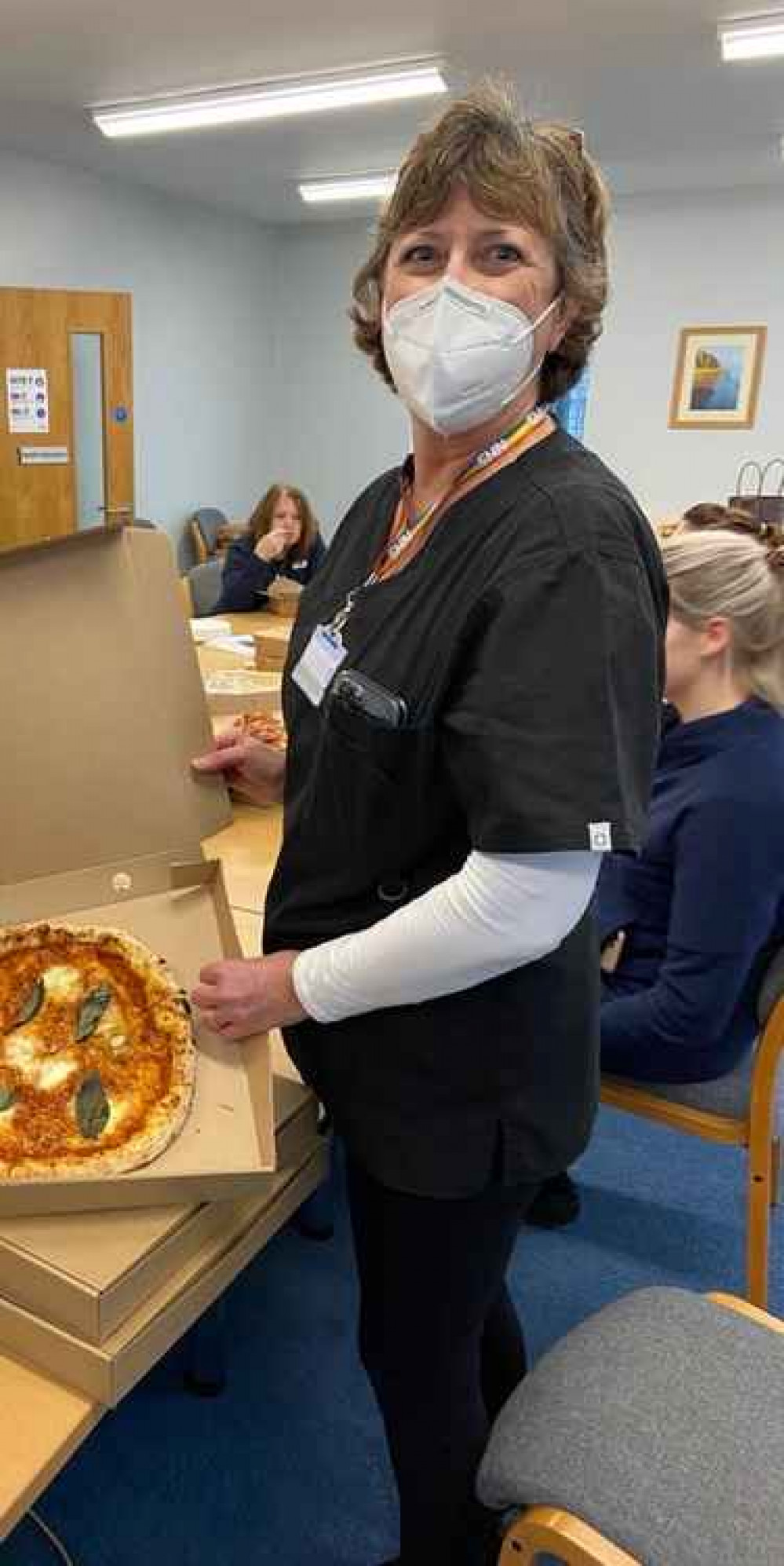 The team enjoying some much-needed pizza from The Parlour in Burton Bradstock