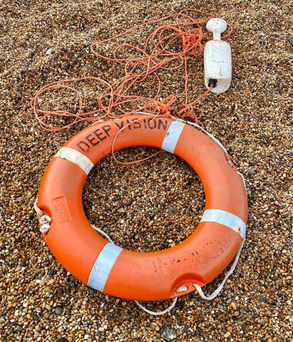 The life ring washed up on Cogden Beach