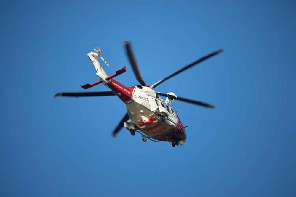 The coastguard helicopter at the scene Picture: Neil Barnes