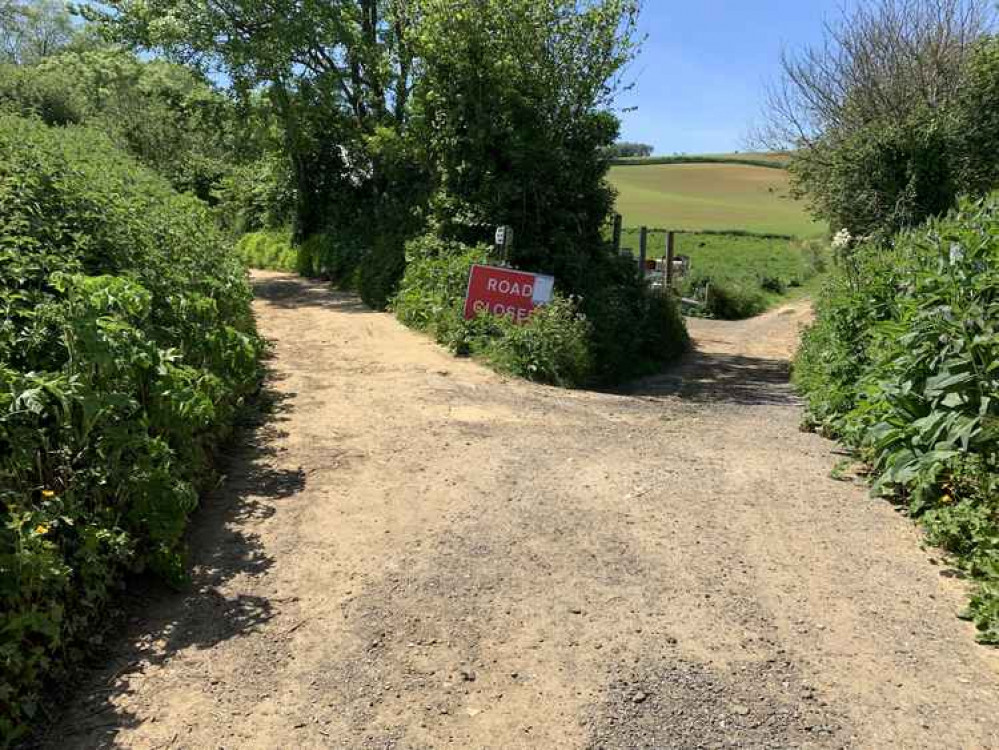 Take the path round to the left to Shutes Lane